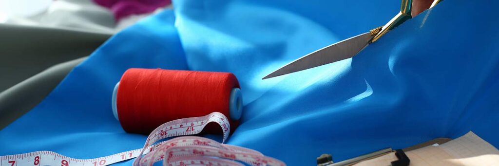 stoff schere und garn